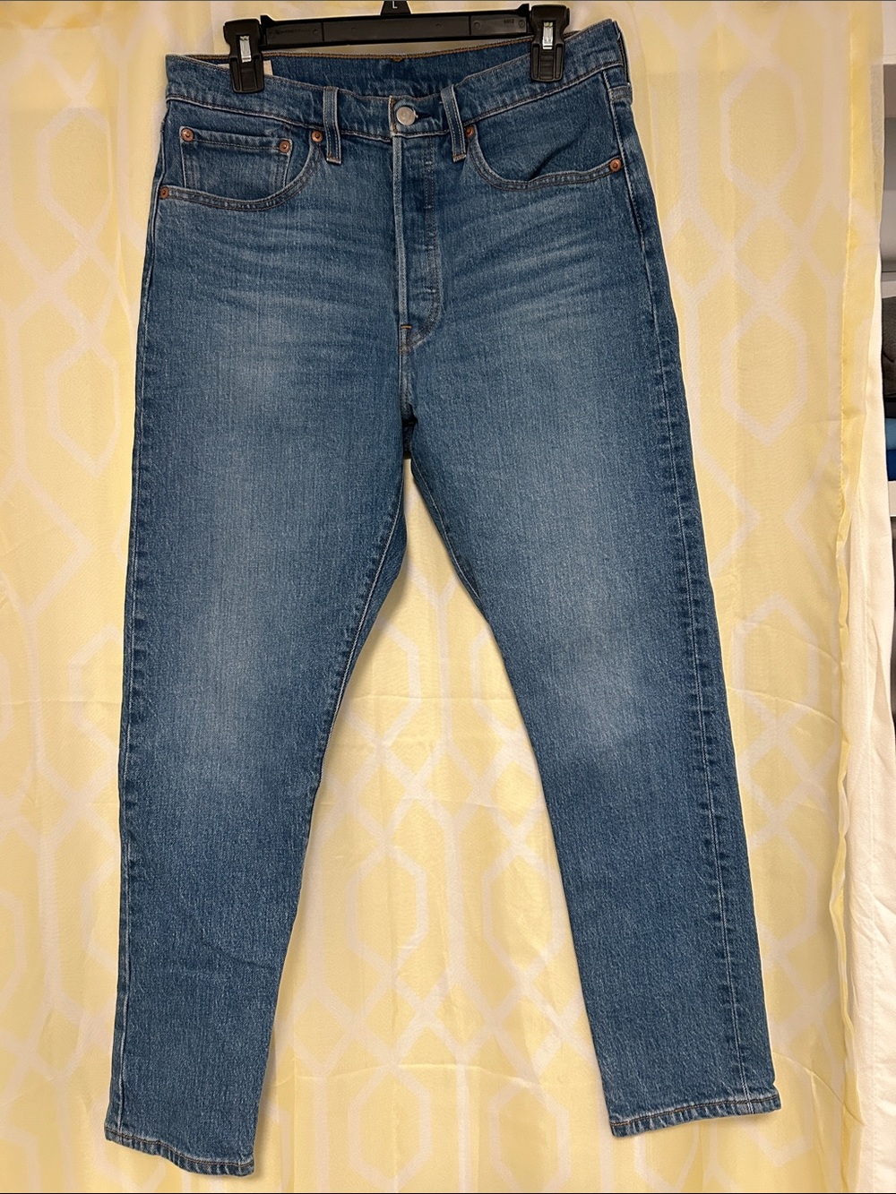 Levi’s: 501 button fly skinny jeans in short length